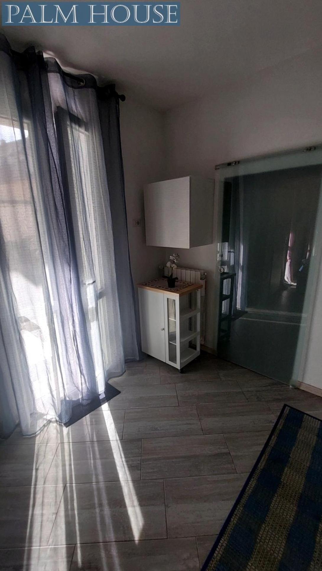 Palm House Apartment Brusimpiano Luaran gambar