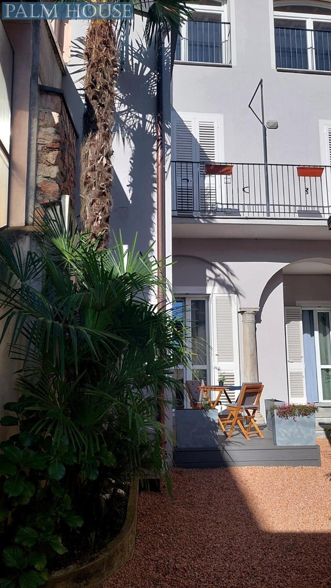 Palm House Apartment Brusimpiano Luaran gambar