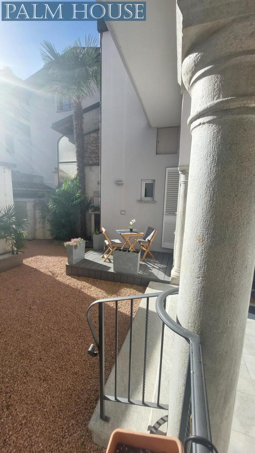 Palm House Apartment Brusimpiano Luaran gambar